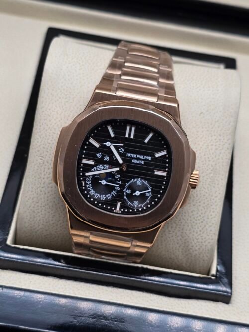 Patek Philippe — caja oro rosa, esfera negra con calendario y brazalete oro rosa