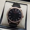 Patek Philippe — caja oro rosa, esfera negra y correa de cuero negra