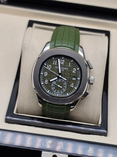 Patek Philippe — cronógrafo con esfera verde y números grandes, correa de caucho verde