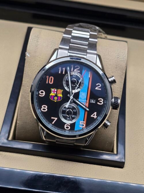 TAG Heuer — cronógrafo con esfera negra con franjas de colores y escudo de fútbol, brazalete de acero