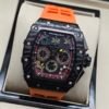 Richard Mille — esfera esqueleto multicolor, caja de carbono y correa de caucho naranja