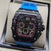 Richard Mille — esfera esqueleto multicolor, caja de carbono y correa de caucho azul