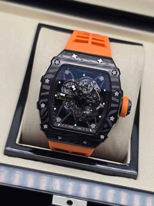 Richard Mille — esfera esqueleto, caja de carbono y correa de caucho naranja