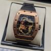 Richard Mille — esfera con dragón dorado, caja oro rosa y correa de caucho negra
