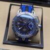 Roger Dubuis — esfera esqueleto con detalles azules, caja de acero y correa azul y negra