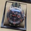 Roger Dubuis — esfera esqueleto con detalles naranjas, caja de acero y correa verde militar