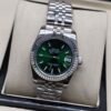 Rolex — esfera verde con bisel estriado y brazalete jubilee de acero