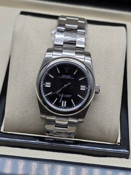 Rolex — esfera negra y brazalete jubilee de acero