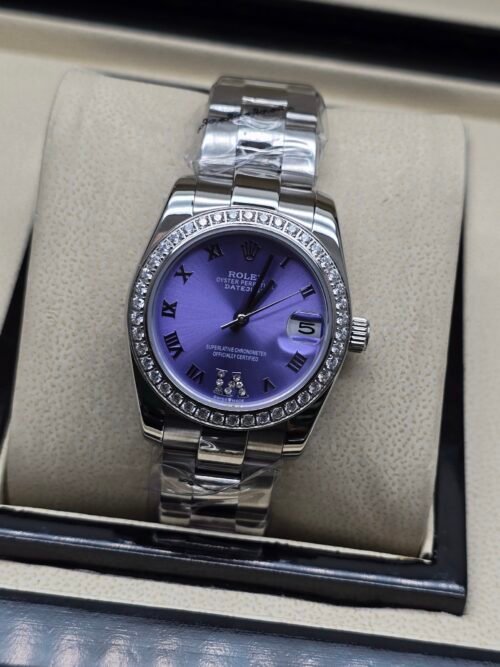 Rolex — esfera lila con bisel de brillantes y brazalete jubilee de acero