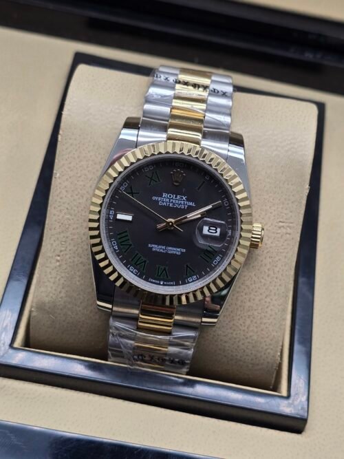 Rolex — esfera gris oscura, bisel dorado estriado y brazalete jubilee bicolor