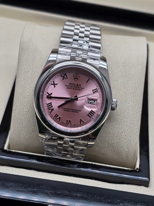 Rolex — esfera rosada con números romanos y brazalete jubilee de acero