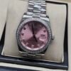Rolex — esfera rosada con brillantes, bisel de brillantes y brazalete jubilee de acero