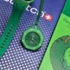 Swatch — reloj de bolsillo octagonal verde con esfera verde y correa verde