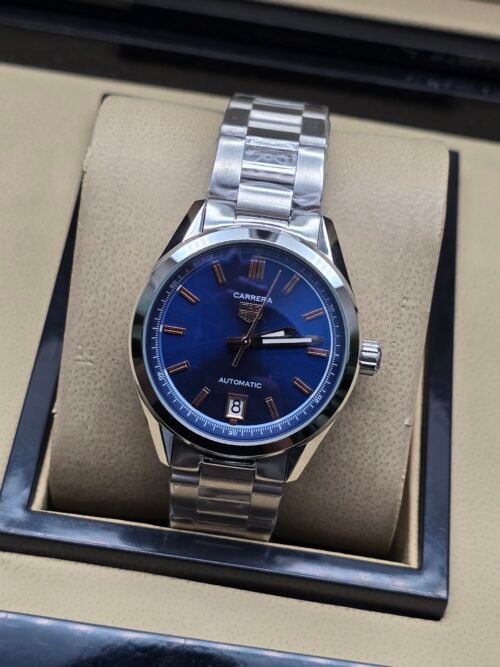 TAG Heuer — esfera azul y brazalete de acero