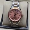 TAG Heuer — esfera rosada, bisel oro rosa y brazalete de acero