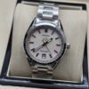 TAG Heuer — esfera blanca con bisel de brillantes y brazalete de acero