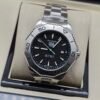 TAG Heuer — esfera negra texturizada y brazalete de acero