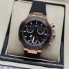 Tissot — cronógrafo con esfera negra, caja oro rosa y correa negra