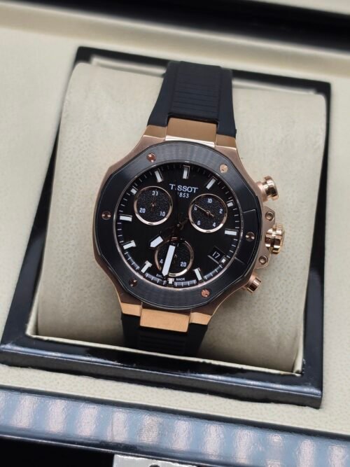 Tissot — cronógrafo con esfera negra, caja oro rosa y correa negra