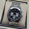 Vacheron Constantin — cronógrafo con esfera negra y subesferas plateadas, brazalete de acero