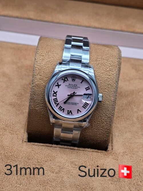 Rolex — esfera rosada con números romanos y brazalete de acero
