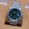 Rolex — esfera verde con bisel estriado y brazalete jubilee de acero