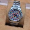 Rolex — esfera multicolor de banderas y brazalete de acero