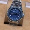 Audemars Piguet — esfera azul texturizada y brazalete de acero