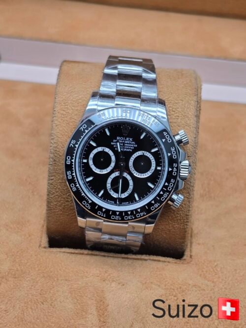Rolex — cronógrafo con esfera negra y brazalete de acero