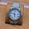 Rolex — esfera blanca con números romanos y brazalete jubilee de acero