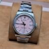 Rolex — esfera rosada y brazalete de acero