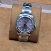 Rolex — esfera lila y brazalete de acero