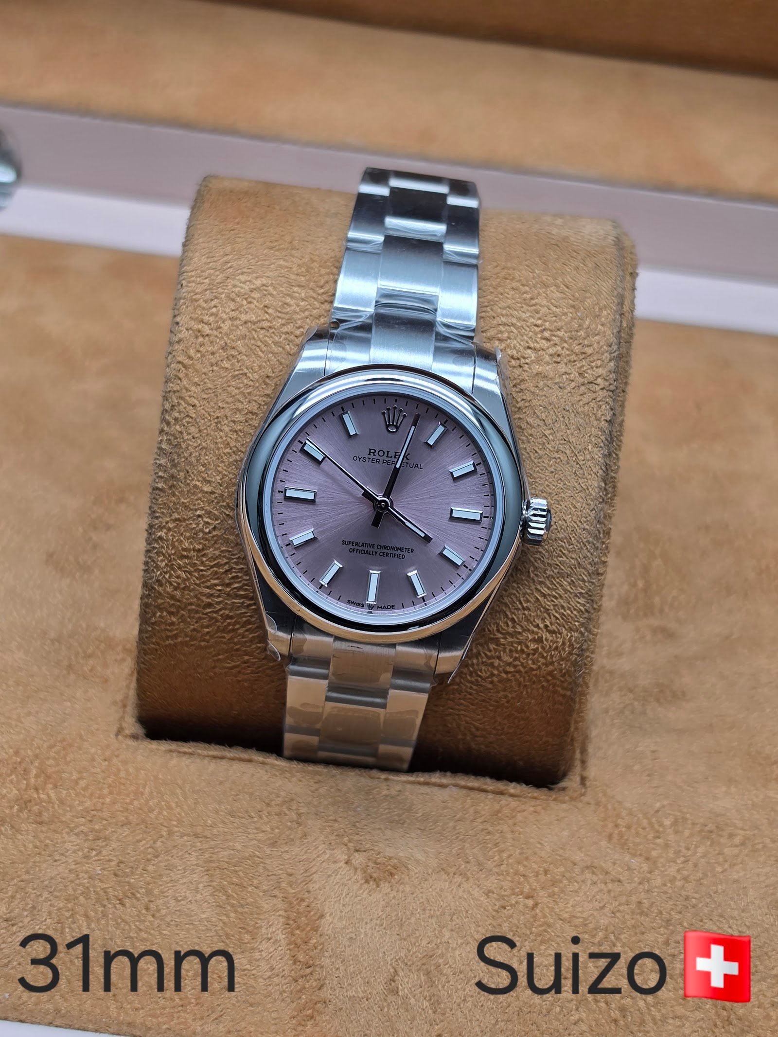 Rolex — esfera lila y brazalete de acero